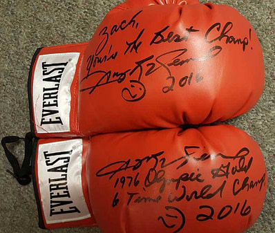 Boxing gloves signed by Sugar Ray Leonard