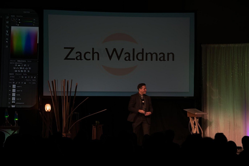 corporate entertainer Zach Waldman performing on stage